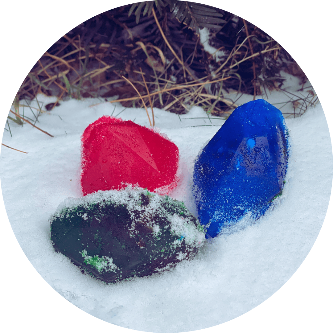 Three frozen ice gems in the snow